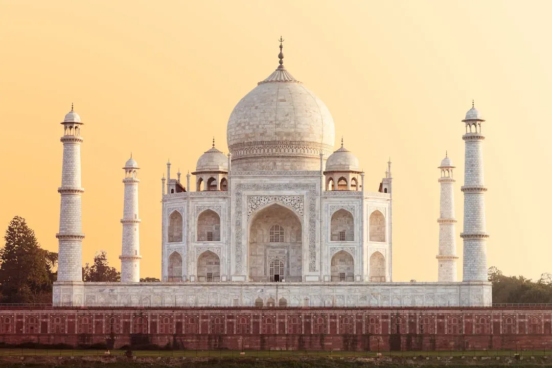 taj mahal at sunset with vibrant colors